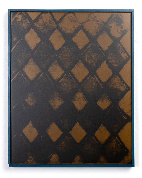 A silkscreened diamond pattern in gold and black.