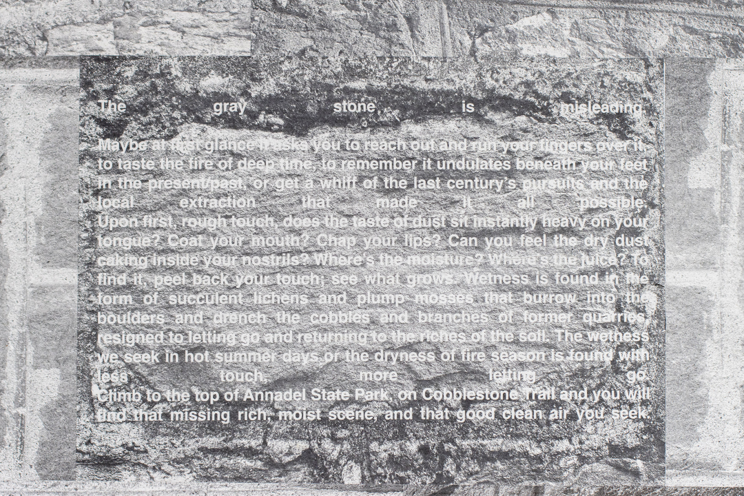A close up of wheatpasted images of stone from stone wall with text